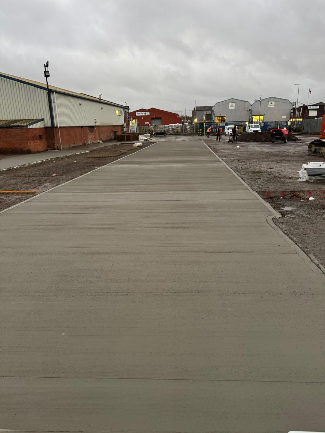 Concrete yard road between industrial units