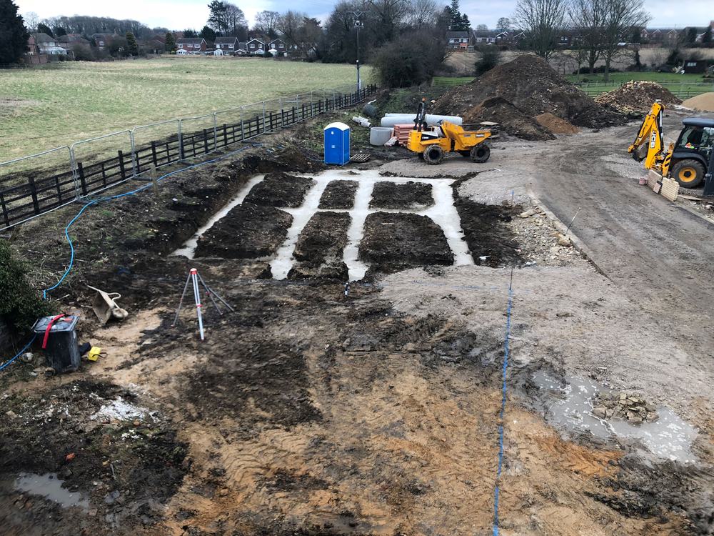 Foundations set out on site with a survey level