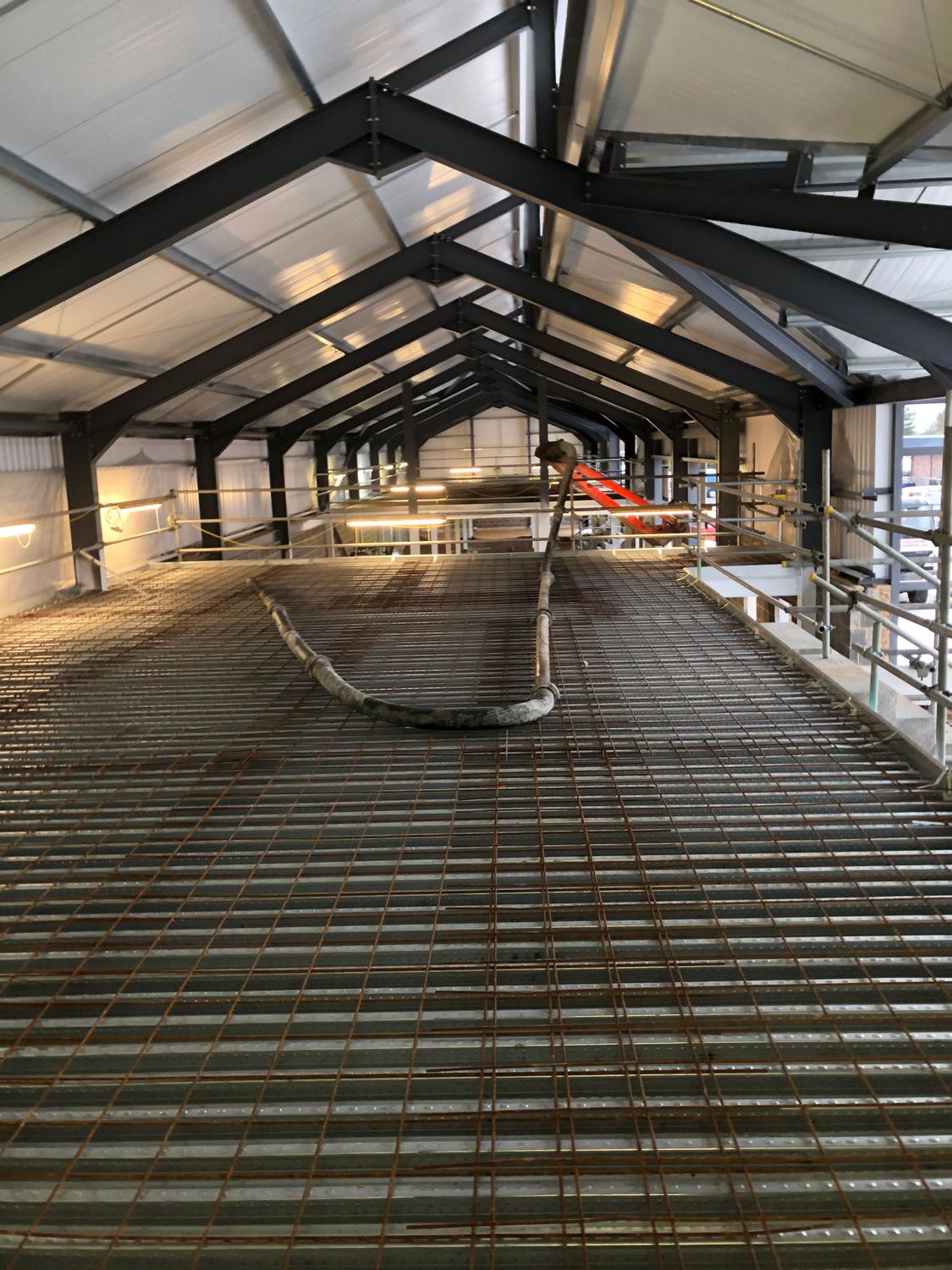Reinforcement mesh laid ahead of a floor pour